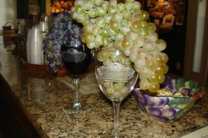 Red and White Grapes on Wine Bar